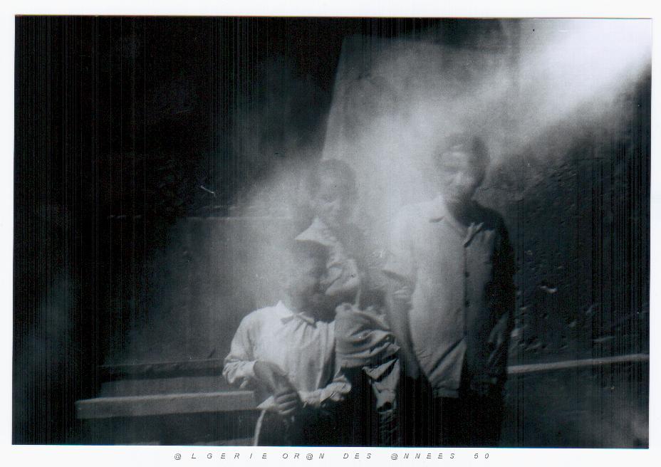 EIF D ORANIE 61 a gauche mon pere yaho+ colette  devant c'est moi max a oran.jpg